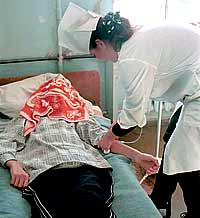 Пациент психиатрического отделения проходит реабилитационные процедуры