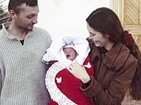 Екатерина и Сергей Федченко с дочерью