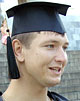 Окончившим магистратуру вручили дипломы и надели мантии с шапочками